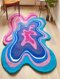 Colorful abstract rug on a wooden floor