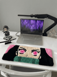 Nezuko inspired Demon Slayer hand-tufted keyboard rug featuring pink eyes, dark hair, pink accents, and green bamboo-inspired detailing for anime gaming and desk décor by Mayur Rugs.