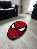Spider-Man themed rug on a wooden floor in a living room setting