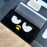 Penguin-Inspired Keyboard Rug