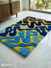 Abstract blue wavy handmade wool rug with flowing wave pattern, modern textured area rug by Mayur Rugs