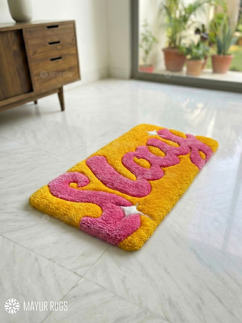 SLAY statement handmade wool rug with bold typography design, modern premium area rug by Mayur Rugs