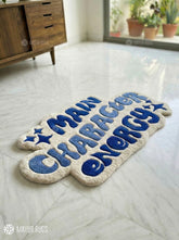Main character energy handmade wool rug with bold statement typography design, premium custom area rug by Mayur Rugs