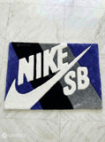 Nike SB inspired hand-tufted wool rug with streetwear skate sneaker aesthetic design, premium custom area rug by Mayur Rugs