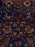 Vintage Persian Heriz hand-knotted wool rug in navy blue with traditional geometric medallion design, premium heritage rug by Mayur Rugs