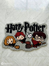 Harry Potter-themed rug with cartoon characters on a textured surface