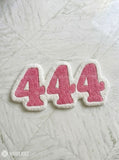 444 aesthetic typography hand-tufted wool rug with pastel pink angel number design by Mayur Rugs