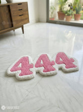 444 aesthetic typography hand-tufted wool rug with pastel pink angel number design by Mayur Rugs