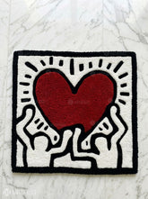 Keith Haring inspired abstract hand-tufted wool rug with pop-art street aesthetic design by Mayur Rugs