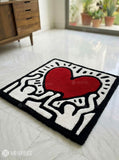 Keith Haring inspired abstract hand-tufted wool rug with pop-art street aesthetic design by Mayur Rugs