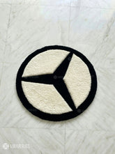 Mercedes logo inspired custom hand-tufted wool rug with luxury automotive aesthetic design by Mayur Rugs