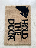 GOT Hold The Door hand-tufted wool rug with fantasy monochrome typography aesthetic design by Mayur Rugs