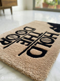 GOT Hold The Door hand-tufted wool rug with fantasy monochrome typography aesthetic design by Mayur Rugs