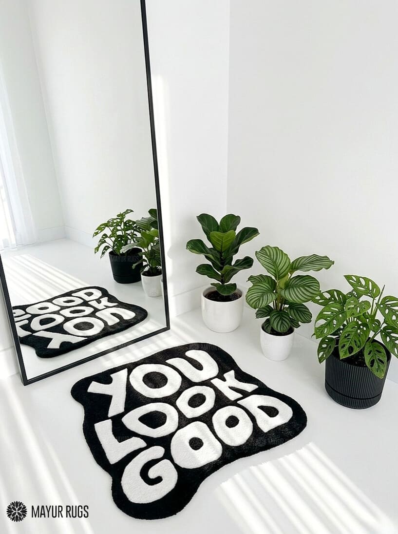 You Look Good typography hand-tufted wool rug with bold black and white affirmation design by Mayur Rugs
