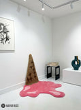 Melting ice cream cone hand-tufted wool rug with pink pop-art aesthetic design by Mayur Rugs