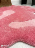 Melting ice cream cone hand-tufted wool rug with pink pop-art aesthetic design by Mayur Rugs