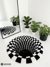 Handtufted black and white optical illusion vortex wool rug with checkerboard geometric design by Mayur Rugs