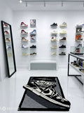 High-top sneaker hand-tufted wool rug featuring monochrome streetwear-inspired footwear artwork by Mayur RugsHigh-top sneaker hand-tufted wool rug featuring monochrome streetwear-inspired footwear artwork by Mayur Rugs