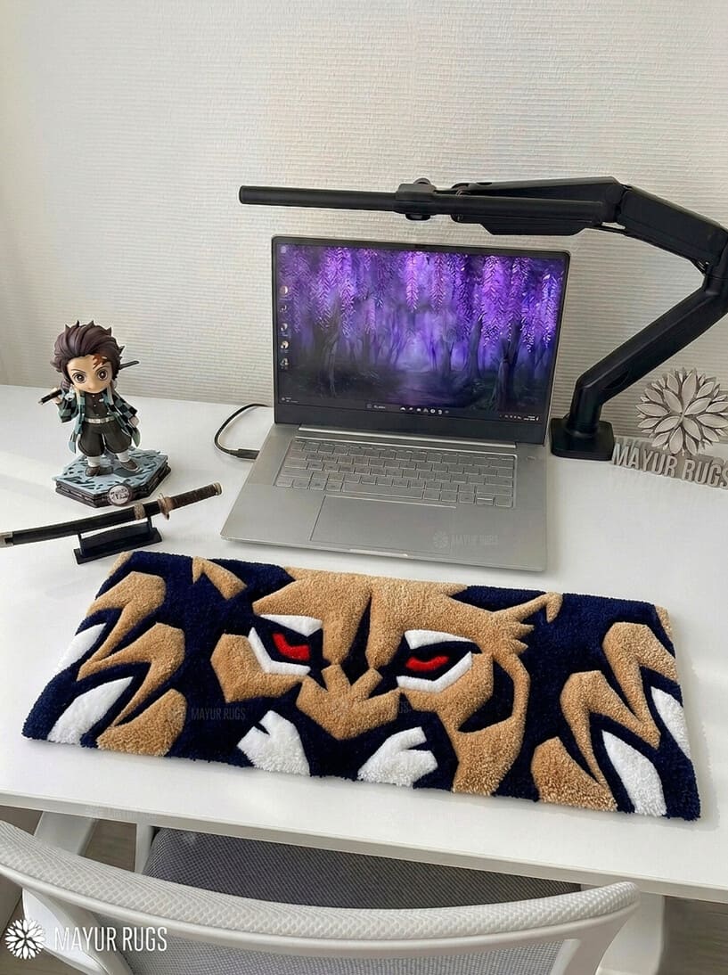 Lion face hand tufted keyboard rug featuring intense red eyes and bold wildlife artwork by Mayur Rugs