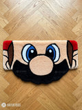 Mario inspired face hand tufted keyboard rug featuring iconic gaming character artwork by Mayur Rugs