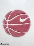 Pink basketball hand tufted wool rug featuring sports-themed design by Mayur Rugs