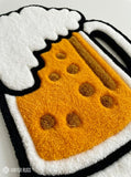 Beer mug hand tufted wool rug featuring frothy beer glass artwork by Mayur Rugs