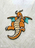 Pokemon Dragonite inspired hand tufted area rug with orange dragon character design handmade by Mayur Rugs
