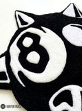 Evil 8 Ball Spiky Custom hand tufted wool rug featuring gothic character artwork by Mayur Rugs.