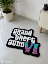 Grand Theft Auto VI hand-tufted logo rug handmade in India by Mayur Rugs featuring bold gaming typography and pastel VI design.