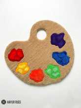 Artist paint palette hand-tufted rug handmade in India by Mayur Rugs featuring colorful paint blobs for creative studio and art room décor.