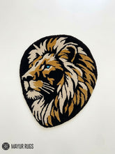 Lion head hand-tufted custom rug featuring a detailed golden, cream, and black lion portrait, handmade from premium New Zealand wool by Mayur Rugs.