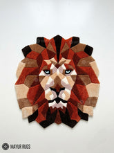 Geometric lion head hand-tufted rug handmade in India by Mayur Rugs featuring a modern low-poly wildlife design with earthy tones and premium wool craftsmanship.