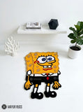 SpongeBob SquarePants hand-tufted custom wool rug featuring a colorful character design with yellow body, white shirt, red tie, and black pants by Mayur Rugs.