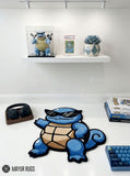 Cool Squirtle Squad hand-tufted custom wool rug featuring a blue Squirtle character wearing black sunglasses with a tan shell and curled tail by Mayur Rugs.