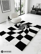 Black and white optical illusion 3D hand-tufted area rug featuring a checkerboard spiral vortex pattern with strong geometric depth by Mayur Rugs.