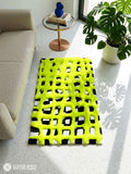 Neon green 3D lattice hand-tufted wool area rug featuring a raised fluffy geometric grid pattern over a black-and-white base for modern contemporary interiors by Mayur Rugs.