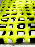 Neon green 3D lattice hand-tufted wool area rug featuring a raised fluffy geometric grid pattern over a black-and-white base for modern contemporary interiors by Mayur Rugs.
