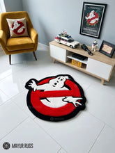 Ghostbusters inspired hand-tufted custom wool rug featuring a white ghost over a red circle with black background, raised 3D details, and a custom circular silhouette by Mayur Rugs.