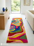 Colorful wavy abstract hand-tufted wool runner rug featuring flowing pink, yellow, green, blue, orange, red, and pastel organic patterns in a vibrant modern design by Mayur Rugs.