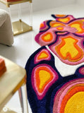 Thermal body art hand-tufted custom wool rug featuring psychedelic layered pink, orange, yellow, magenta, navy, and white contour artwork with a 3D sculptural design by Mayur Rugs.