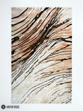 Modern flow silk-inspired hand-tufted wool area rug featuring flowing black, cream, beige, taupe, and soft peach organic lines in a contemporary abstract luxury design by Mayur Rugs.