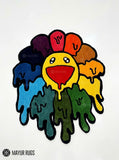Custom-shaped hand-tufted rug featuring a yellow smiley flower surrounded by red, orange, purple, blue, teal, and green dripping petals with black outlines by Mayur Rugs.