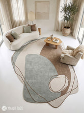 Irregular modern abstract rug featuring sage grey, taupe, ivory, and brown organic shapes with delicate looping contour lines by Mayur Rugs.