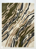 Rectangular Sandstorm Camo abstract rug in olive green, beige, charcoal grey, and ivory with a flowing camouflage-inspired pattern by Mayur Rugs.
