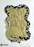 Shop the Python Snake Hand-Tufted Irregular Area Rug by Mayur Rugs. Handmade with premium New Zealand wool featuring a flowing reptile-inspired design, 16–20mm plush pile, custom sizing, and export-quality backing.