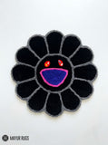 Takashi Murakami flower inspired hand-tufted custom rug handmade in India by Mayur Rugs featuring a smiling flower design crafted from premium New Zealand wool with a dense plush pile.
