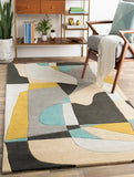 Colorful abstract rug in a living room setting with furniture and decor.