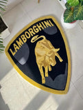 Lamborghini logo doormat on a tiled floor