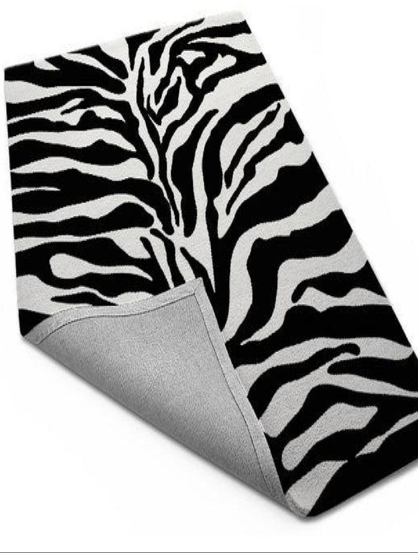 Zebra print fabric with gray border on a white background