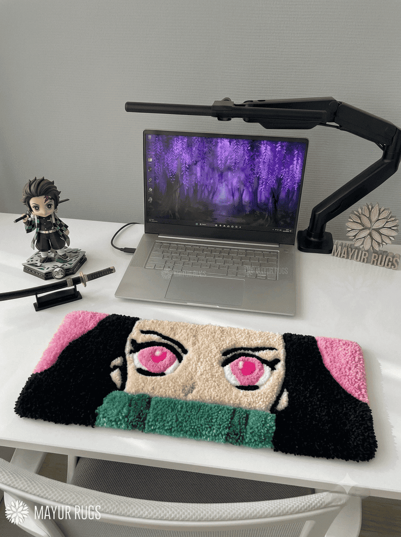 Nezuko inspired Demon Slayer hand-tufted keyboard rug featuring pink eyes, dark hair, pink accents, and green bamboo-inspired detailing for anime gaming and desk décor by Mayur Rugs.